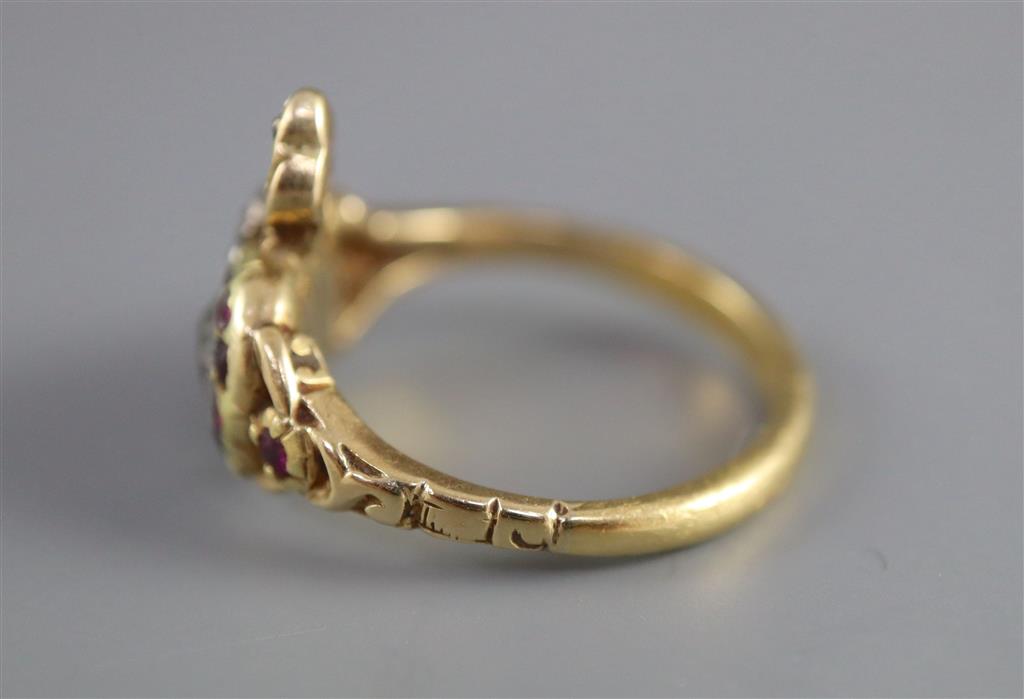 A 19th century 18ct gold, foil backed garnet? and diamond set twin hearts ring,